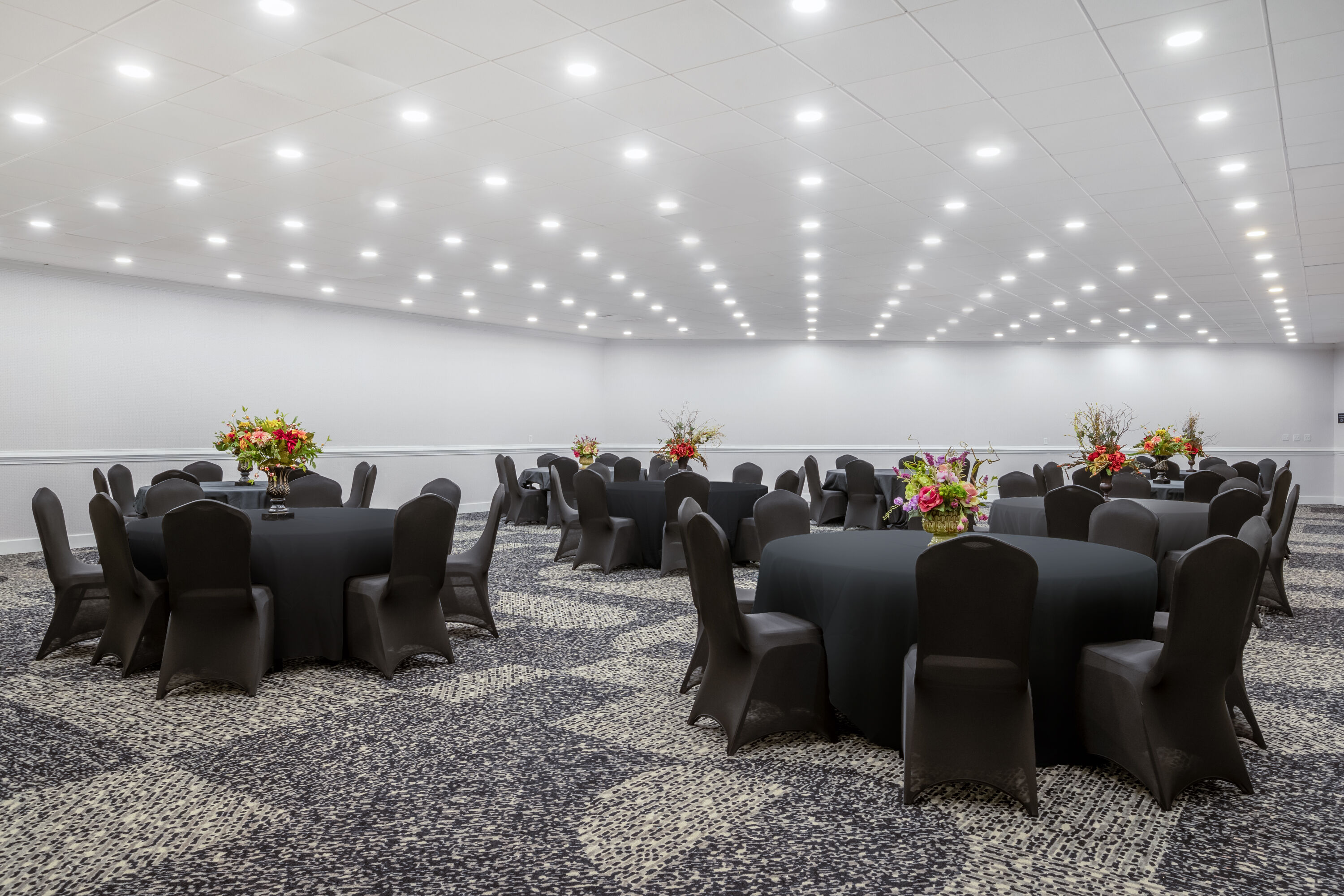 Banquet round tables set inside an event room at Wyndham Garden Columbia / Ft. Jackson